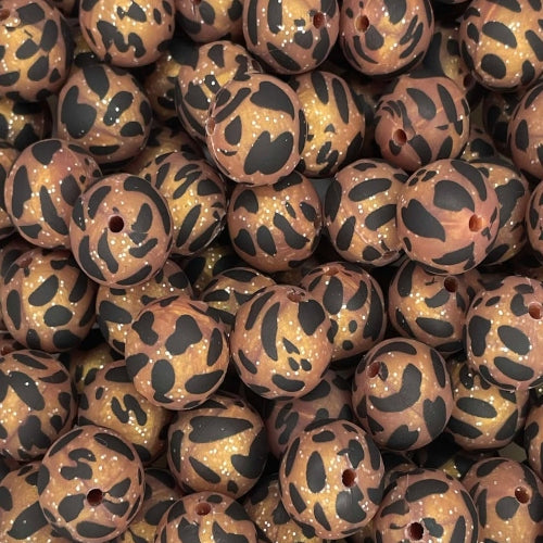 P569 BROWN GLITTER COW 15MM PRINT (10ct)