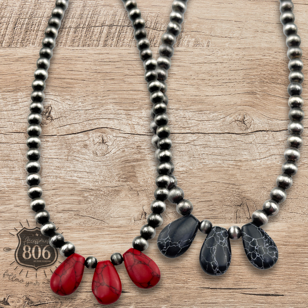 Three stone teardrop necklace