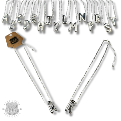 Silver letter pendant on necklace, initial monogram