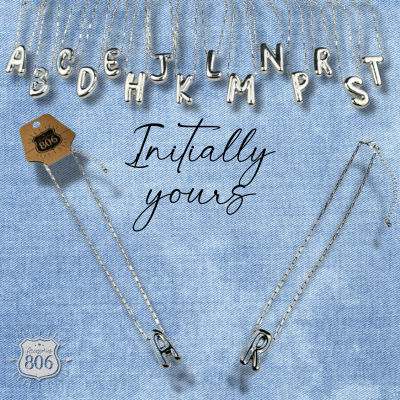 Silver letter pendant on necklace, initial monogram