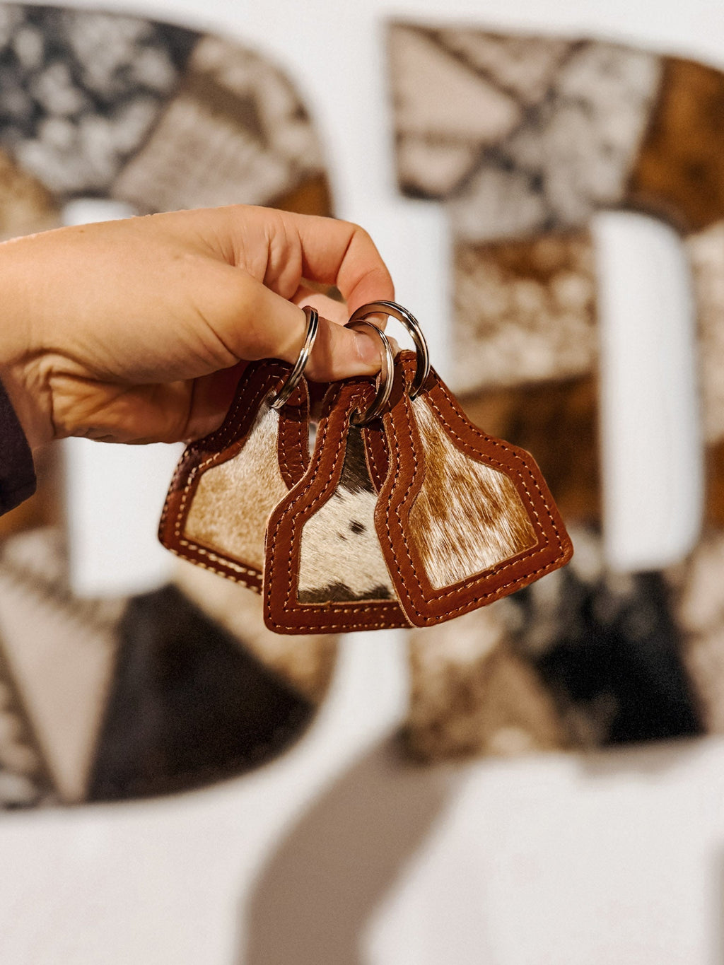 Cow Tag Cowhide Keychain - Quarter Circle AK Boutique