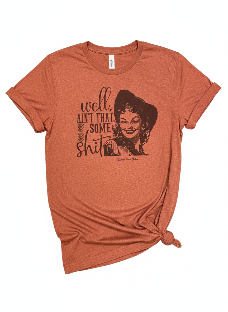 "Well, Ain't That Some Sh*t" Retro Cowgirl Tee | Bella + Canvas 3001 Heather Clay Unisex T-Shirt | Funny Vintage Western Graphic | Sassy Boutique Country Top